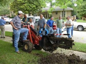 trenching a new lawn sprinkler system in Fort Worth, Texas